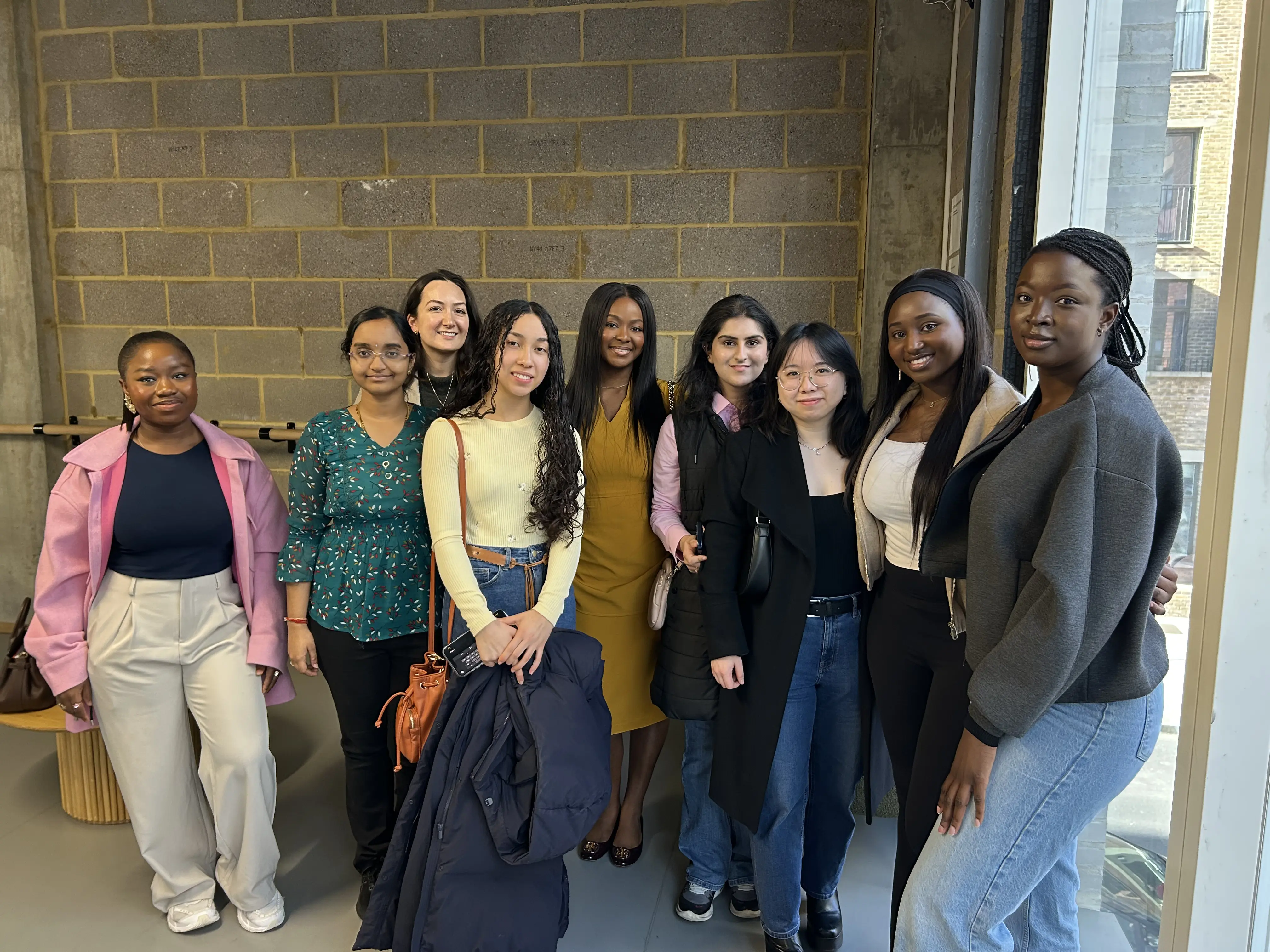 Women in data connecting at an event